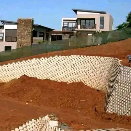 Engineered structural retaining wall